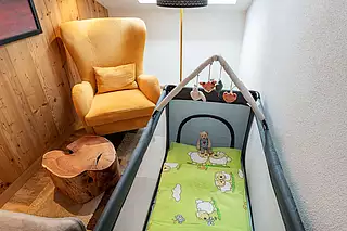 ALMA Appartements Babybett