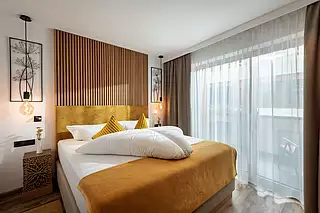 ALMA Appartement SOMMER Schlafzimmer 1