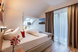 ALMA Appartement HERBST Schlafzimmer 3